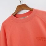 Fear of God Essentials Crewneck Sweatshirt ‘Coral’ - Image 2