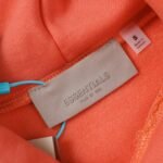 Fear of God Essentials Hoodie 'Coral' - Image 4
