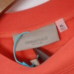 Fear of God Essentials Crewneck Sweatshirt ‘Coral’ - Image 9