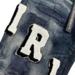 Amiri Ripped Woolen Logo Jeans - Image 8