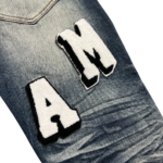 Amiri Ripped Woolen Logo Jeans - Image 3