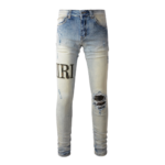 AMIRI Logo Distressed Skinny Jeans