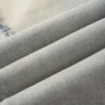 AMIRI Logo Distressed Skinny Jeans - Image 4