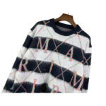 AMIRI Black & White Argyle Sweater - Image 9