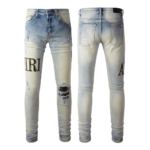 AMIRI Logo Distressed Skinny Jeans - Image 15