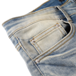 AMIRI Logo Distressed Skinny Jeans - Image 9