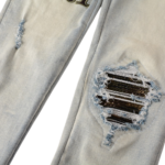 AMIRI Logo Distressed Skinny Jeans - Image 10