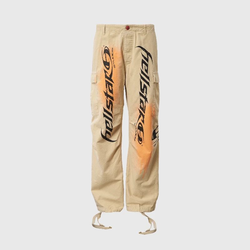 hellstar-spray-paint-studio-cargos-beige-cargo-pants-with-orange-graphic.webp Hellstar Spray Paint Studio Cargos - Image 1